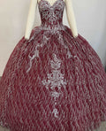 A beautiful gown, off-shoulder, reveals noble air.